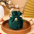 Elegant dark green velvet drawstring wedding favor bag with pearl and golden charm - With Double Happiness Pendant And Pearl / Dark Green