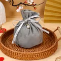 Elegant grey velvet drawstring gift pouch featuring silver ribbon and a pearl charm decor - With Pearl Decoration / Gray