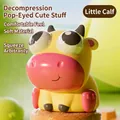Simpatico giocattolo da spremere a forma di mucca gialla con divertenti occhi pop - Mucca Gialla Occhi Pop Squishy