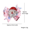 Glittery Santa Claus pink Christmas bow hair clip featuring festive snowman pattern print - Sequin Santa Claus Style / Pink