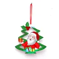 Green glittery Christmas tree hanging ornament featuring a cartoon Santa Claus design - Hollow Christmas Tree Style (XG-14)