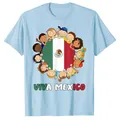 Light blue Viva Mexico T-shirt featuring a diverse kids and Mexican flag graphic print - XS / Tops / Sky Blue