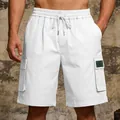 Gedetailleerde weergave van witte outdoor cargo shorts voor heren met multi-zakken - S / Bottoms / Wit