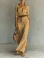 Detailed view of an elegant khaki maxi dress with irregular pleats and a waist belt. - XS / Top And Bottom / Khaki