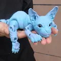Close-up detail of a blue 3D printed hairless cat figurine with movable articulated joints - 50cm / Season Blue