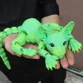 Close-up detail of articulated joints on large green 3D printed Sphynx cat figure toy - 50cm / Season Green