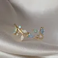 Elegante anello regolabile in oro con zirconi marquise multicolore a forma di foglia - Aperto Regolabile / Blu Chiaro Verde Mentha Bianco Floreale (JZ001)