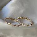 Elegante anello regolabile placcato oro con zirconi viola e design floreale chic - Aperto Regolabile / Petali Continui Zirconia Viola (JZ021)