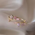 Elegante anello regolabile in oro con fiori di zircone rosa e viola su sfondo di raso - Aperto Regolabile / Rosa Viola Goccia Fiore Vite (JZ022)