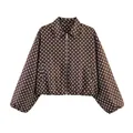 Macro view of a brown vintage short jacket featuring white polka dots and front zipper - S / Tops / Brown