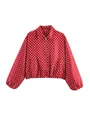 Close-up view of red retro polka dot jacket featuring a zipper and classic collar - S / Tops / Red with White Polka Dots