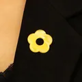 Elegant yellow hollow flower brooch and glasses holder pin on a black blazer lapel - 01 Yellow K-735