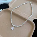 Dettaglio della collana di perle in stile francese con ciondolo in zircone scintillante - Collana / Argento