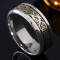 Premium titanium steel men's ring featuring a golden dragon pattern on black background - Black Gold