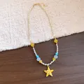 Dettaglio collana di perline con ciondolo a stella marina gialla e resina colorata - Collana con Perline Stella Marina Oro / Giallo