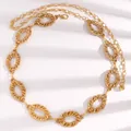 Elegant golden metal chain belt with textured oval links specifically for women's dresses. - Gold Spiral Texture Oval Style (11858)