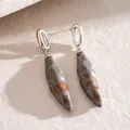 Close-up showing the unique stone-like texture and geometric design of these resin earrings. - Stud Pin Style / Silver-Gray (HE34431)