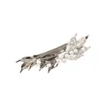 Detailed close-up view of a silver leaf-shaped alloy hair clip with white pearl accents. - Silver