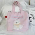 Pink Japanese style drawstring tote bag featuring a cute white puppy embroidery design - Embroidered Drawstring Shoulder: Little White Dog (Pink)