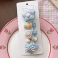 Five pieces set of cute fabric-wrapped baby hair clips with star and flower designs. - Blue Candy Clip Style