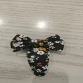 Charming floral print bow hair snap clip featuring wavy edges for kids hair styling - Black Floral