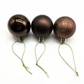 Lot de trois boules de Noël marron avec finitions brillante, mate et pailletée. - Brun Foncé / 3cm