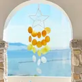 Star shaped shell wind chime with orange and yellow gradient hanging pieces for decor - Finished Product / Star Shell - Orange
