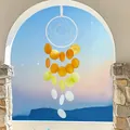 Handmade coastal shell wind chime featuring gradient orange and yellow shell disks - Finished Product / Full Moon Shell - Orange