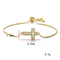 Adjustable gold cross bracelet featuring zircon micro-inlay and hollow cut design - Copper Zirconia 18K Gold Plated