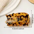 Pince à cheveux chat en écaille de tortue avec motif doré et indications de taille - Tortoise