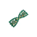 Macro view of luxury emerald green rhinestone bow hair clip with golden alloy spring - Green Gold Style (2)