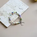 Colorful Jingdezhen ceramic beaded bracelet with silver butterfly and feather charms. - Nineteen Songs (1002-03) / Multicolor