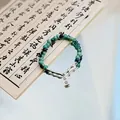 Vintage Jingdezhen green ceramic beaded bracelet with bamboo silver charms and Pingan tag - Peace and Joy (1006-08) / Dark Green