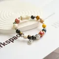 Handmade Jingdezhen ceramic beaded bracelet with blessing charms and colorful beads. - Lucky Awakening Lion (1009-03) / Red