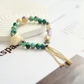 Elegant Jingdezhen ceramic beaded bracelet featuring green glaze beads and tassel - Good Luck Lion (1009-05) / Green