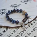 Elegant Jingdezhen ceramic beaded bracelet featuring antique silver bell charms and chain - Wealth Coming (1011-05) / Dark Blue