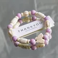 Handmade ceramic beaded bracelet featuring purple round beads and a white butterfly charm. - 1075-10 Sweet Berry Jam Style