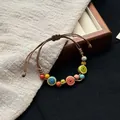 Handmade colorful ceramic bead bracelet with adjustable brown cord - 1047-03 Nanxi Style