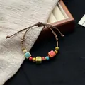 Handmade Jingdezhen ceramic bead bracelet featuring colorful cubes and brown woven cord - 1047-05 Mengjing Style