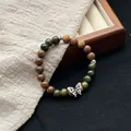 Ancient style beaded bracelet with green ceramic beads and silver butterfly charm - 1098-06 Tanying Style