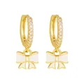Detailed view of gold-plated hoop earrings with elegant white enamel bow charms - Smiley Face Enamel Gold Studs