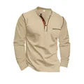 Detail view of a men's beige stand collar long sleeve henley shirt with pocket. - Khaki
