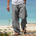 Détail du pantalon décontracté en lin gris pour hommes à jambe droite porté sur la plage - M / Bottoms / Gris