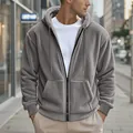 Dettaglio della felpa grigia in pile con cappuccio e zip con texture molto calda - S / Tops / Grigio