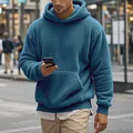 Men's blue oversized sherpa fleece hoodie with front pocket and drawstring hood - S / Tops / Blue
