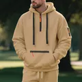 Men's tan fleece pullover hoodie with orange zipper detail in a forest setting - M / Tops / Khaki