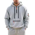 Detail of a grey men's fleece hoodie with orange zipper accents and sleeve pocket - M / Tops / Light Gray
