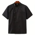 Vista frontale di una giacca da cuoco nera professionale su una gruccia in legno - XS / Tops / Nero