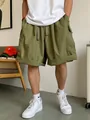 Pantaloncini cargo oversize verde militare da uomo con multitasche ed elastico in vita - S / Bottoms / Verde oliva
