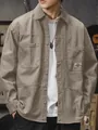 Men's vintage khaki cotton workwear shirt featuring long sleeves and chest pockets - XS / Tops / Khaki